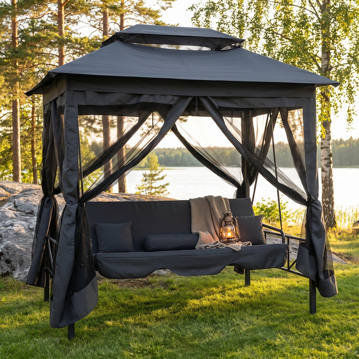 Antracitgrå vidaXL-hammock med paviljongtak och myggnät på alla sidor på en gräsmatta vid en svensk sjö en sommarkväll
